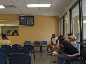 Changing your last name requires the joyful wait at the DMV. Photo by Brian Holcomb.
