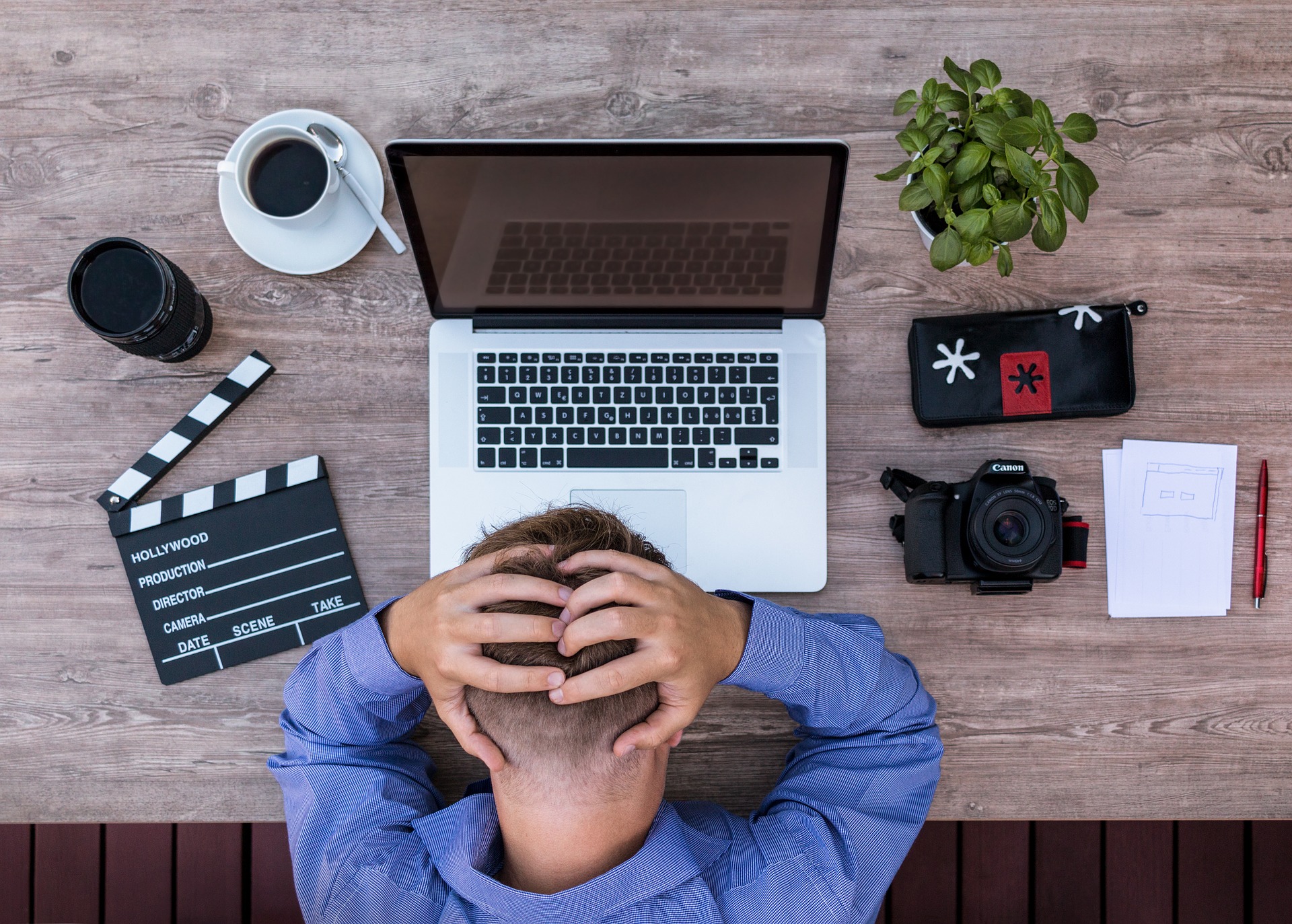 Thinking man frustrated with computer.